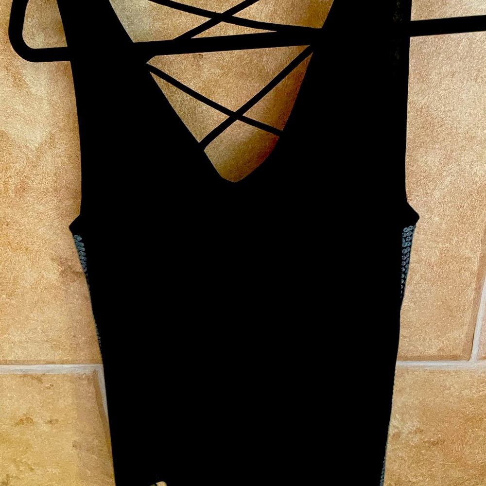 Tank style dress up or down black sheer top with silver thread